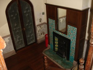 Tiled fireplace in a downstairs room in Windybrow