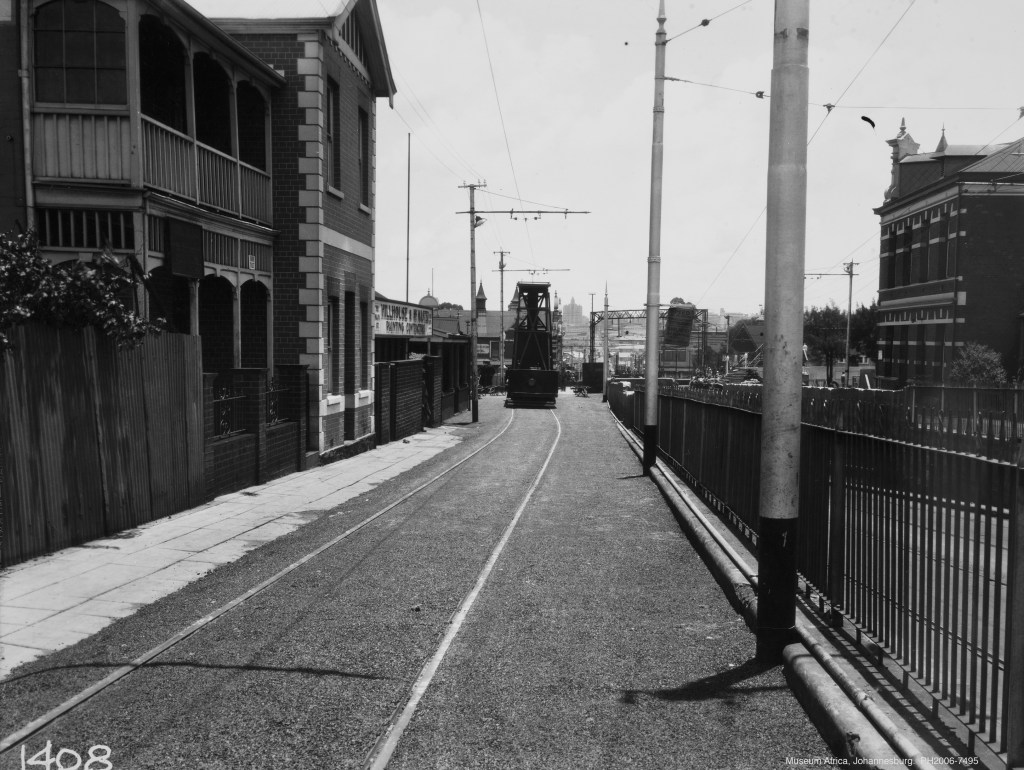 The Post office is on the right and Grand Station behind the vehicle on the tracks