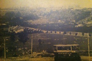 Tram going up Jan Smuts with underdeveloped Valley Road in the background
