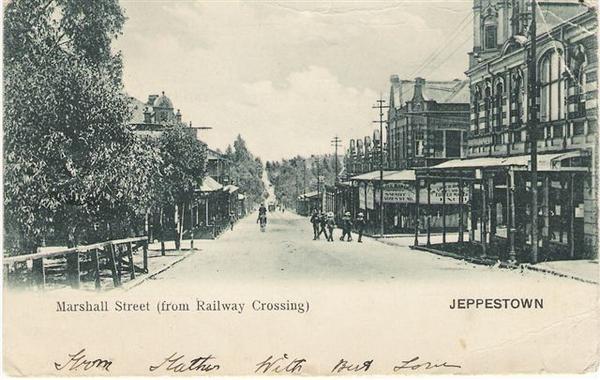 View down Marshall Street in early 1900s with the pharmacy on your left