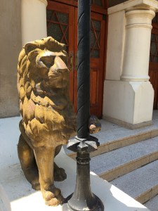One of the gold lions outside the entrance