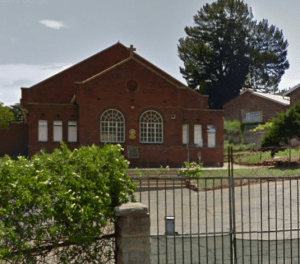 McDonald Hall next to the church