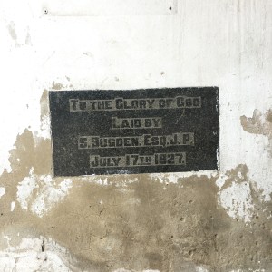 Foundation stone for the yellow building next door