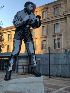 Mandela boxing street art installation opposite Chancellor house